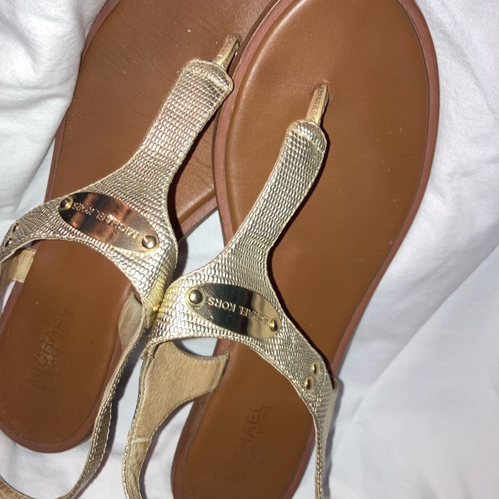Micheal Kors woman’s sandals, they have been worn